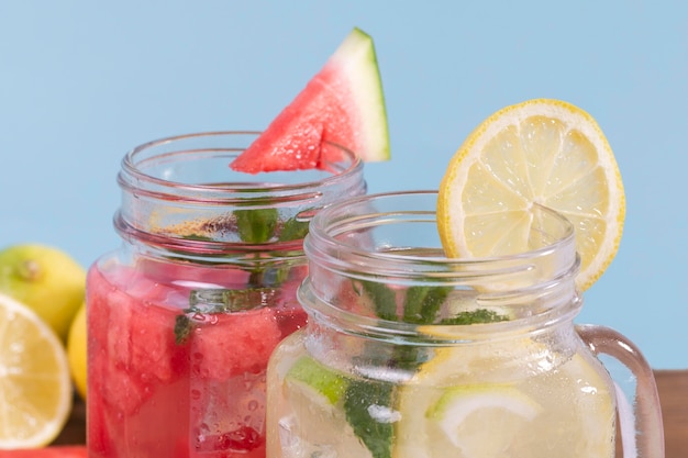 Free photo close-up jars with fresh drinks