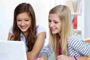 Free photo close-up of joyful girls in class