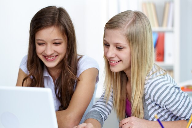 Close-up of joyful girls in class