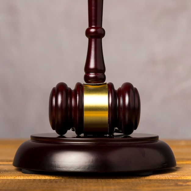 Close-up judge gavel with its striking block