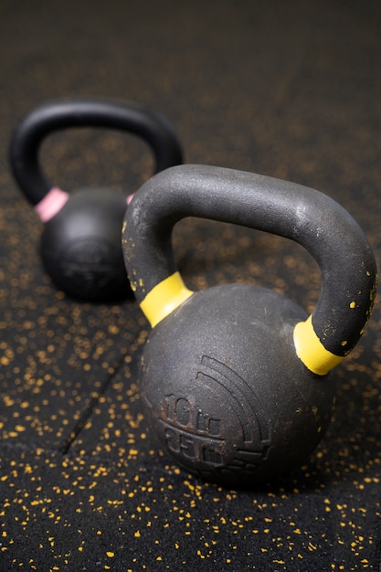 Close up on kettlebells in gym