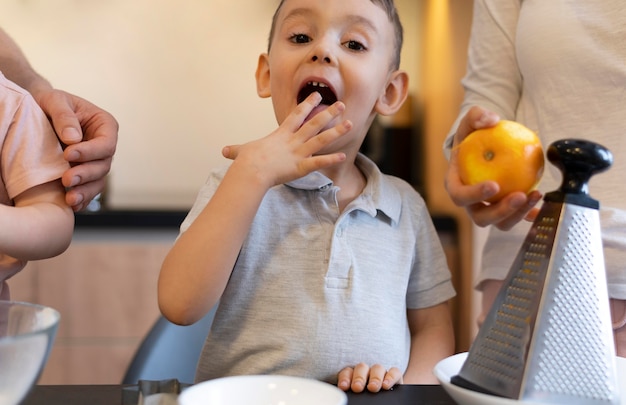 Free photo close-up kid in kitchen