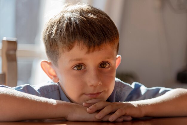 Close up  kid laying on table