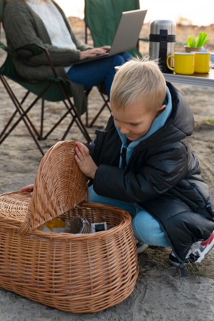 Close up kid looking in basket