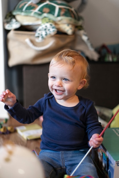 Close up on kid playing indoors