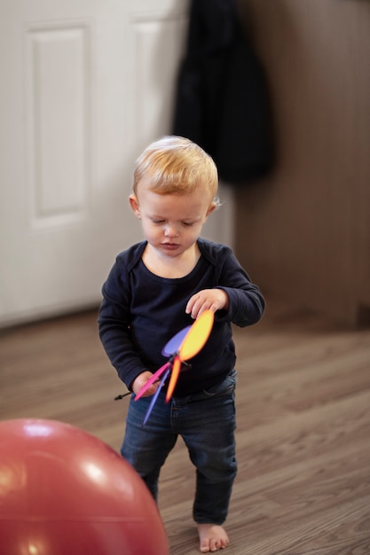 Close up on kid playing indoors