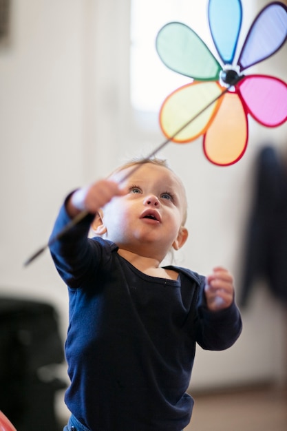 Close up on kid playing indoors