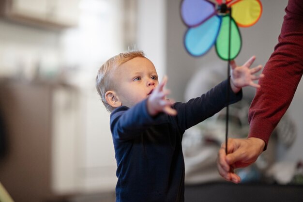 Close up on kid playing indoors