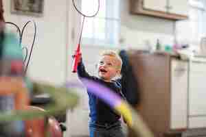 Free photo close up on kid playing indoors