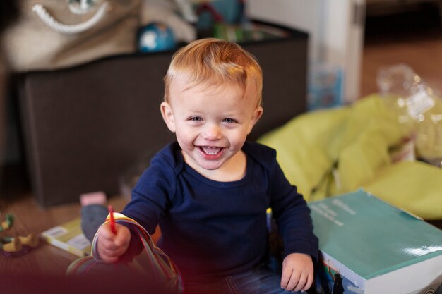 Close up on kid playing indoors