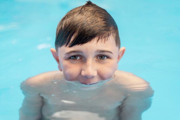 Close up kid in pool