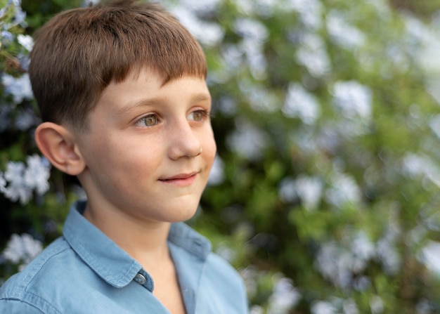 Close up kid posing outdoors