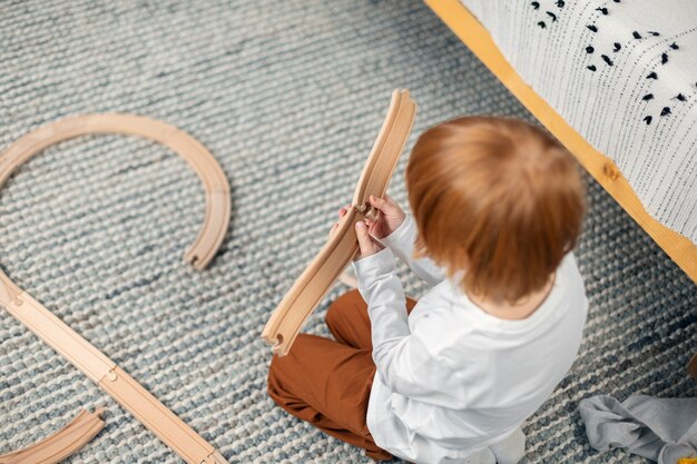 Close up on kid in their room having fun