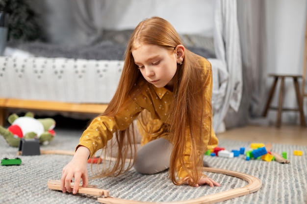 Close up on kid in their room having fun