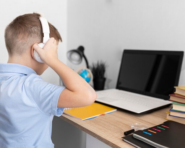 Close up kid wearing headphones