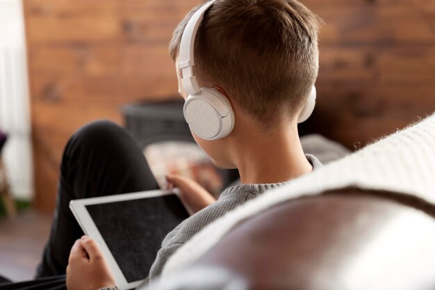 Close up kid wearing headphones