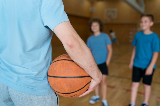 Free photo close up kids at school gym