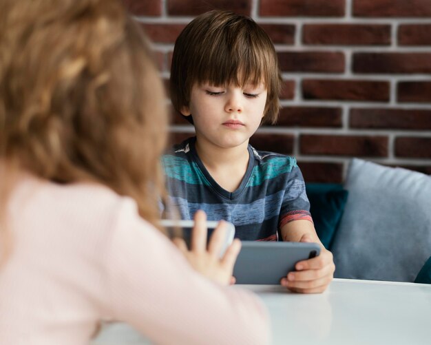 close-up kids with tablet and phone