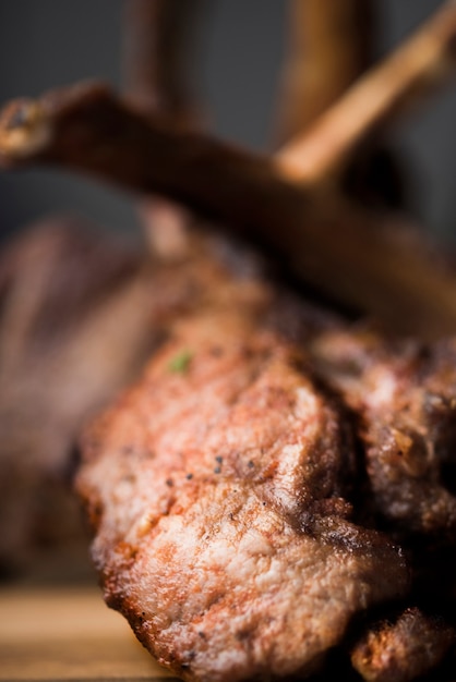 Close-up lamb chops on wooden board