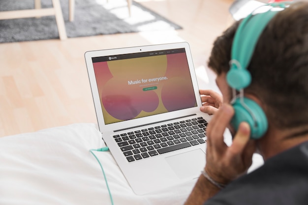 Close-up of laptop with spotify app