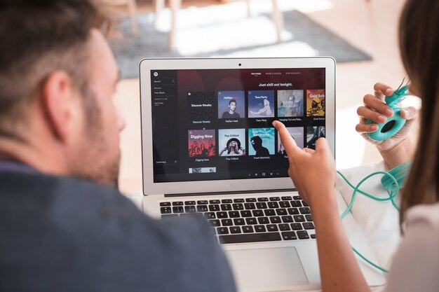 Close-up of laptop with spotify app