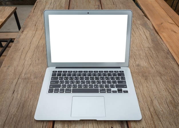 Close-up of laptop on wooden table