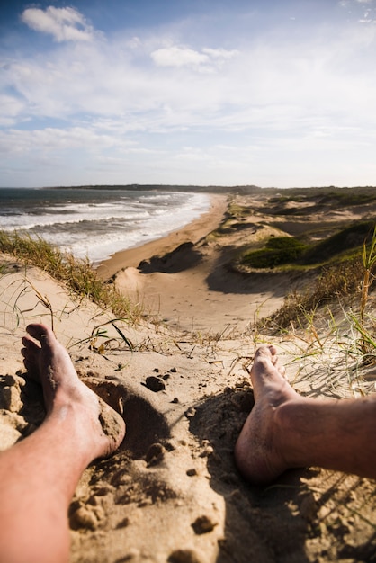  close up legs at beach landscape