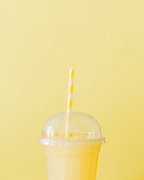 Free photo close-up of lemon shake with straw