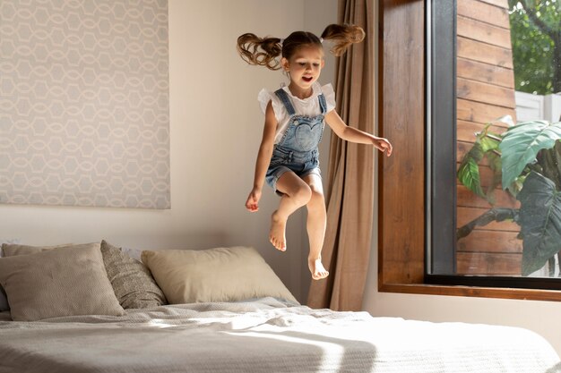 Close up on little girl having fun at home