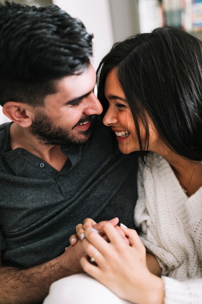 Close-up of loving couple loving at each other