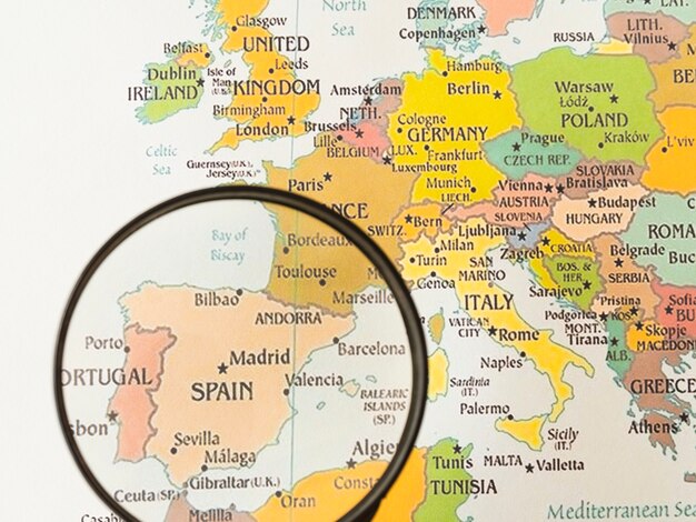 Close up magnifying glass showing spain