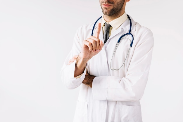 Close-up of a male doctor pointing index finger