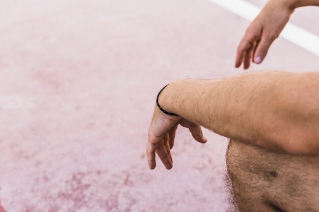 Close-up of a male hand in court