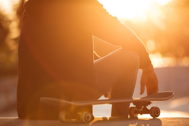 Free photo close up of a male teenager having break while sitting