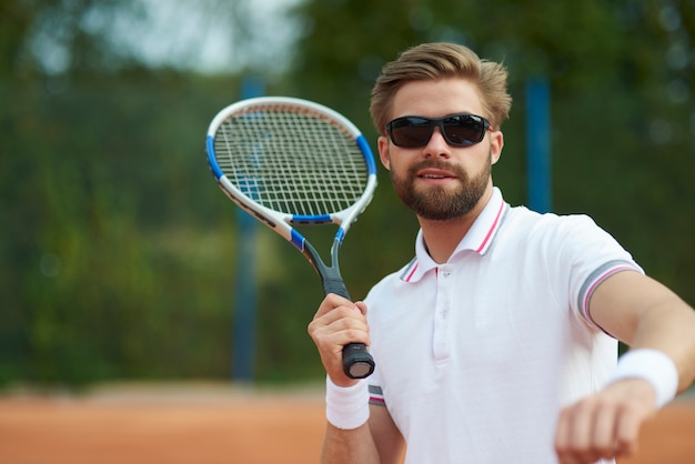 Close up of man about to have an ace 
