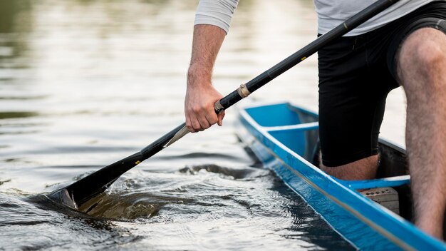 Close-up man in canoe