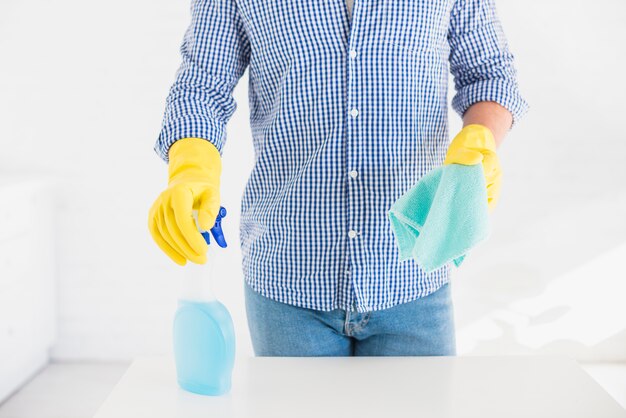 Close up of man cleaning his house