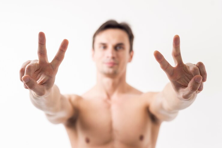 Free Photo close up man gesturing peace sign