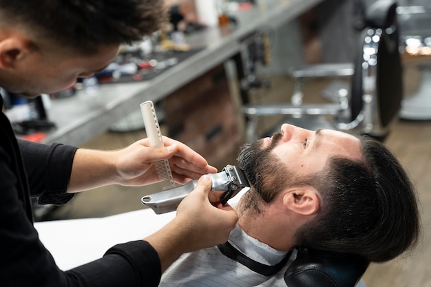 Close up man getting groomed