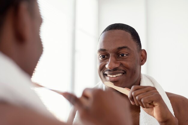 Close up man holding brush