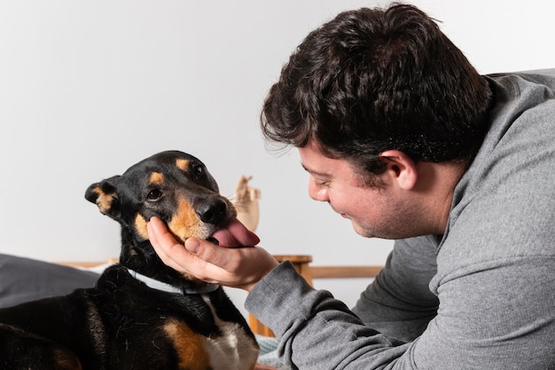 Close up man holding dog