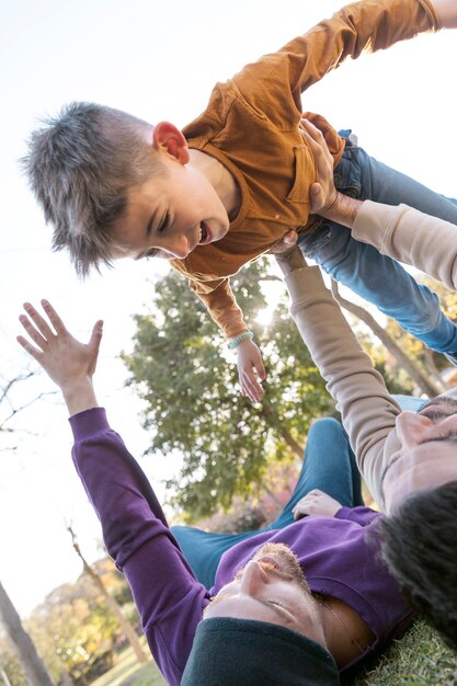 Close up man holding kid