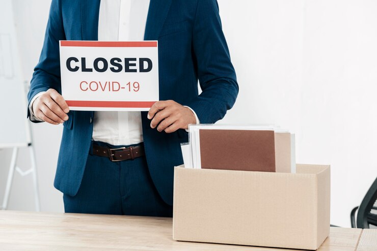 Free Photo close-up man holding sign
