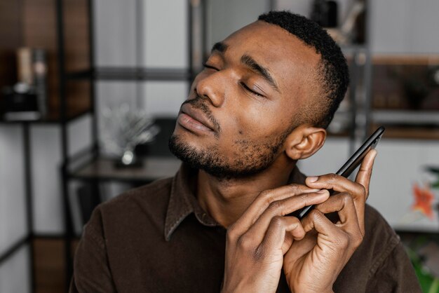 Close up man holding smartphone