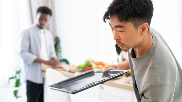 Close up man holding tray