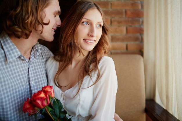 Close-up of man hugging his girlfriend