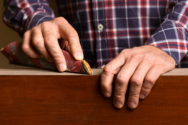 Close-up man polishing