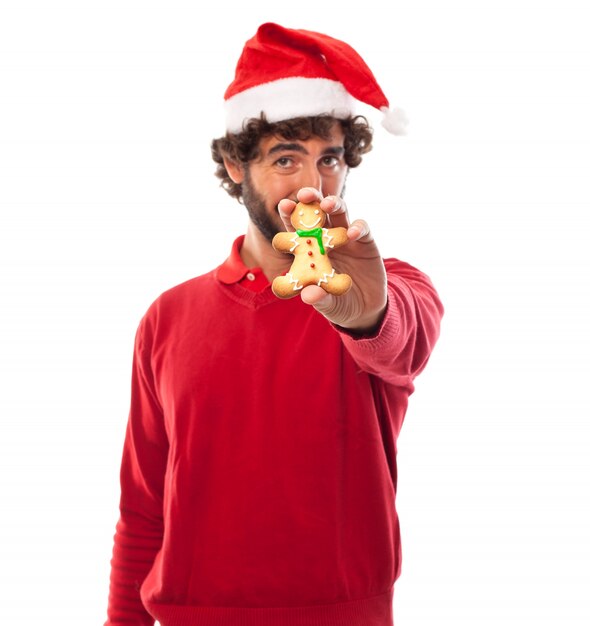 Close-up of a man posing with his tasty cookie