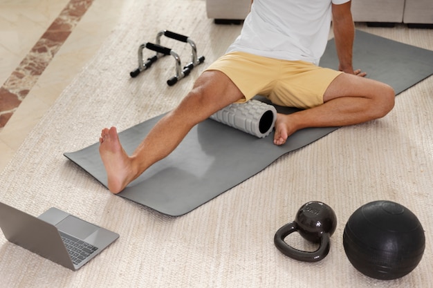 Close up man sitting on mat