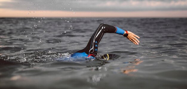 Close-up man swimming